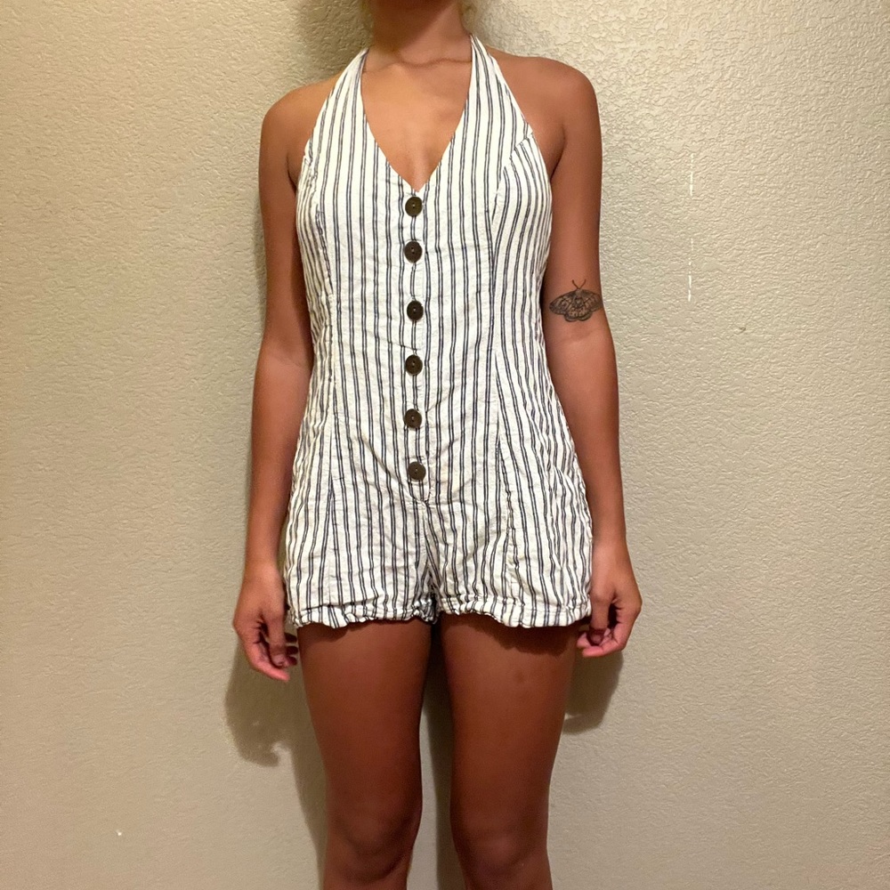 striped halter tie romper with an open back